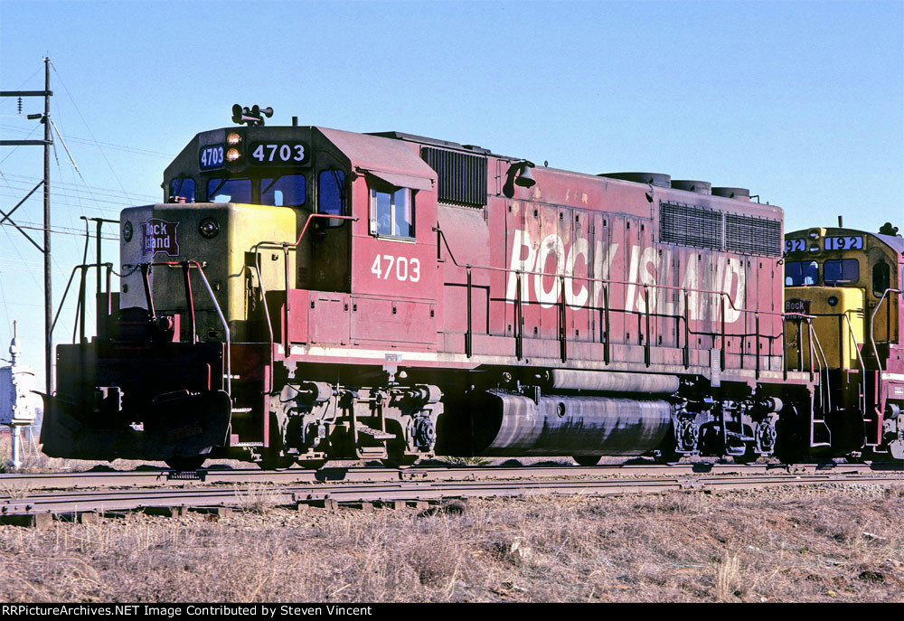 Rock Island GP40 #4703 leads a WB freight.